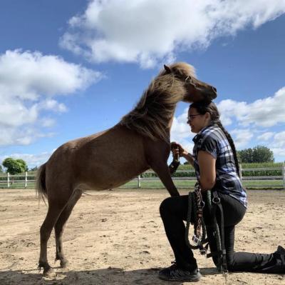 Zhawanoogbiik Danielle Riley cares for horses and other animals at the Riley Ranch On Three Fires. (Photo via Facebook.)